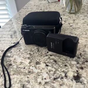 Canon Black Digital Camera with Case and Charger